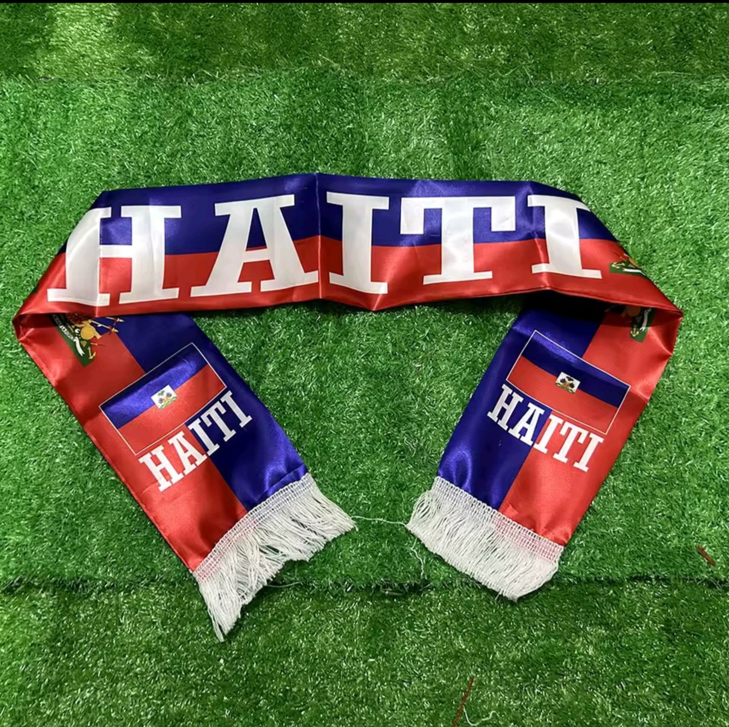 Haiti-themed scarf with red, white, and blue colors on a grass background