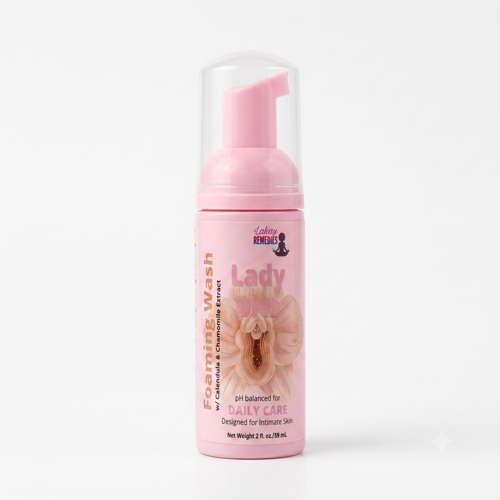 A pink foaming wash bottle with a clear cap and pink pump dispenser, labeled 'Lady Bits' and 'Foaming Wash' on a clean white background.