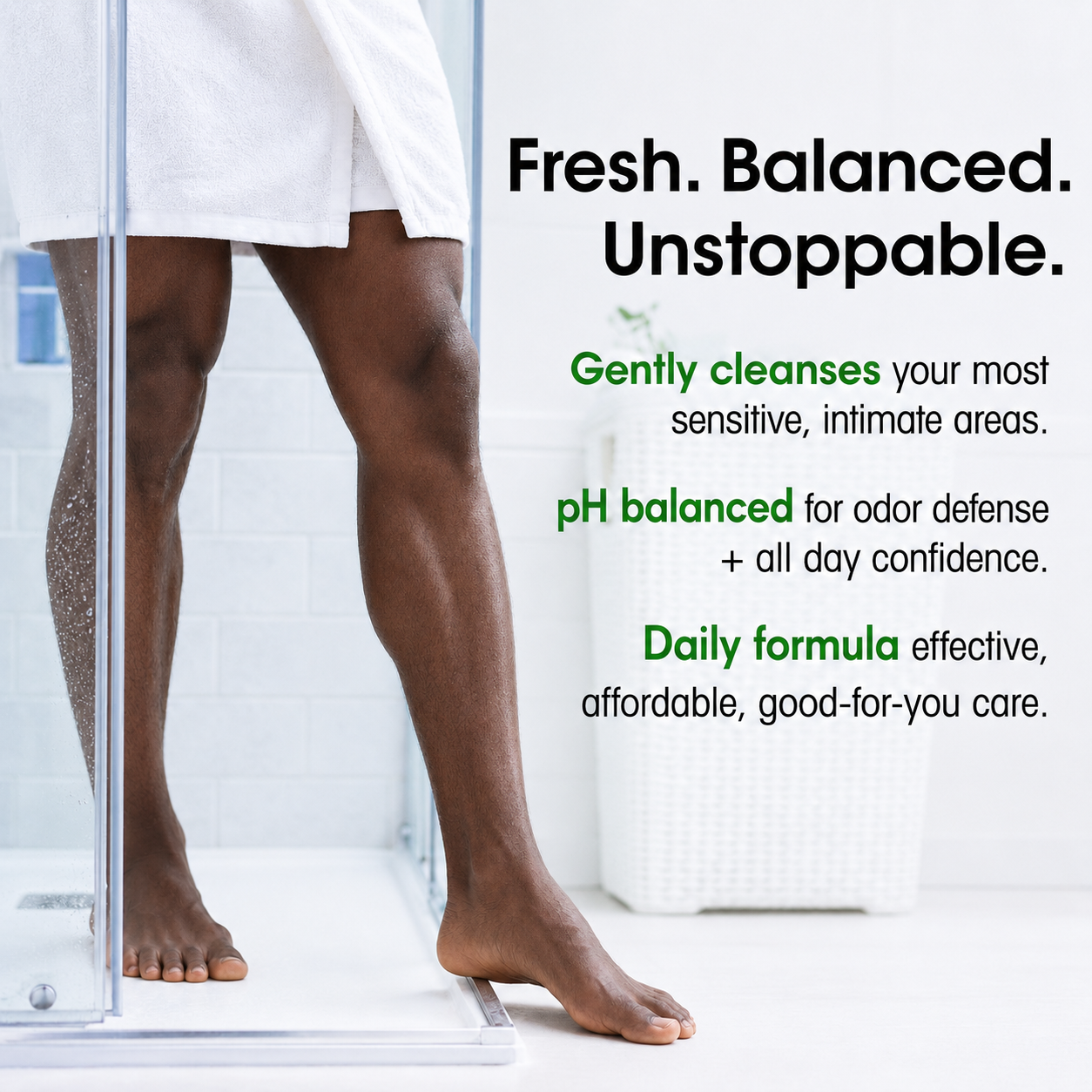 A man wearing a white robe stands inside a glass shower enclosure in a bright bathroom, with text on the right describing product benefits for sensitive, intimate area cleansing and odor defense.