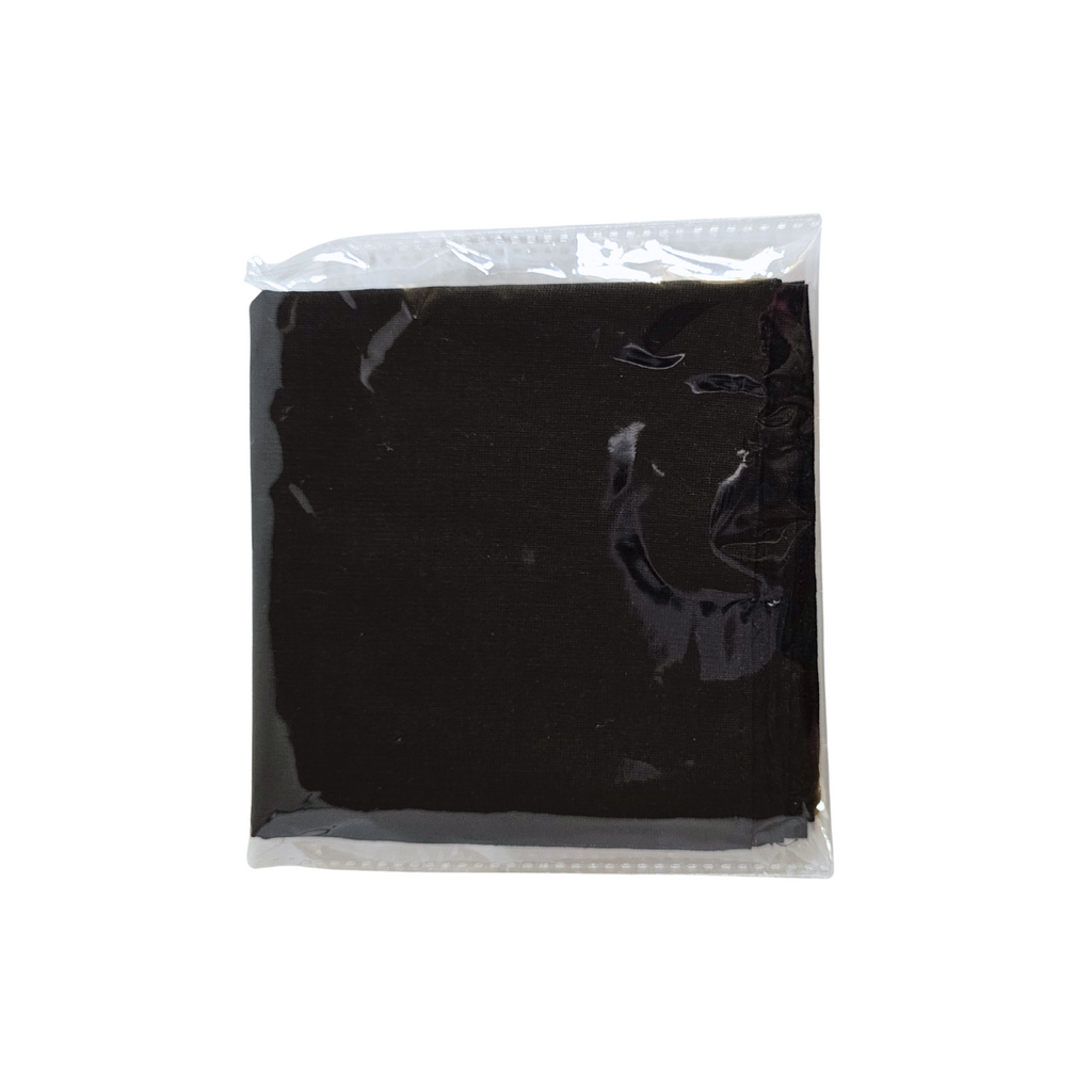 Black fabric Spiritual Mouchwa in a clear plastic bag on a white background