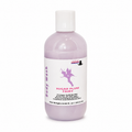 A bottle of Sugar Plum Fairy body wash by Lakay Remedies, featuring a translucent lavender bottle, white cap, and a white label with purple and pink text and graphics.