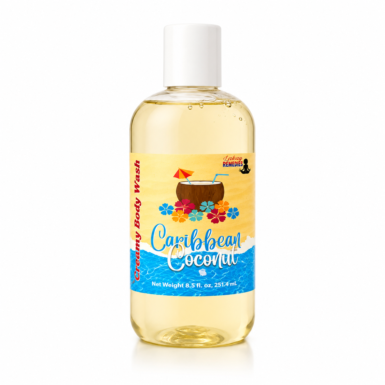A bottle of Caribbean Coconut Creamy Body Wash. The product is a clear plastic bottle filled with a pale yellow liquid, featuring a white cap and a colorful tropical-themed label with a coconut drink illustration.