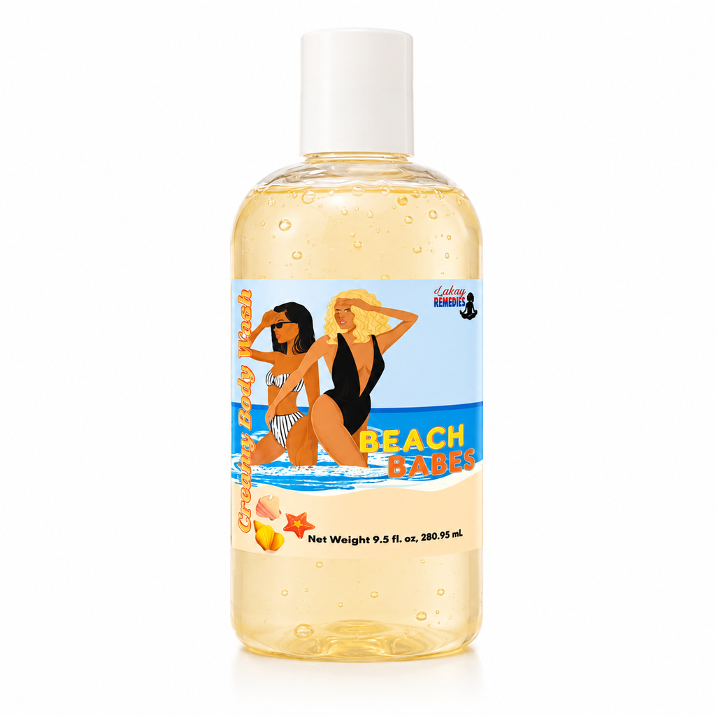 A clear plastic bottle of Beach Babes body wash with a white cap, filled with a pale yellow liquid. The label features a colorful illustration of two women on a beach with the text 'BEACH BABES'.