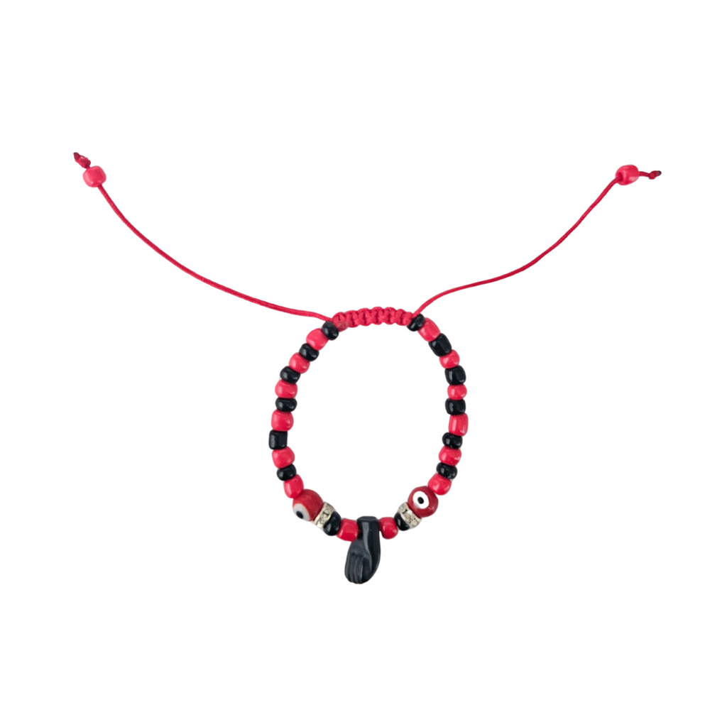 Beaded bracelet with red and black beads on a white background