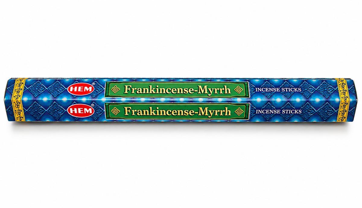 A roll of HEM Frankincense Myrrh incense sticks, featuring a blue and gold patterned design with two green bands displaying the product name.