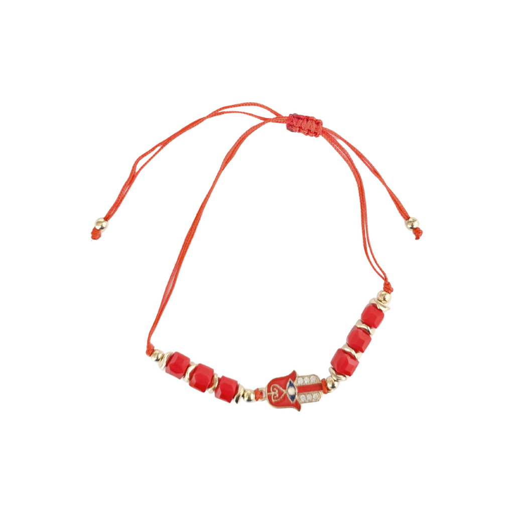 Hamsa Hand Red beaded bracelet with gold accents on a white background