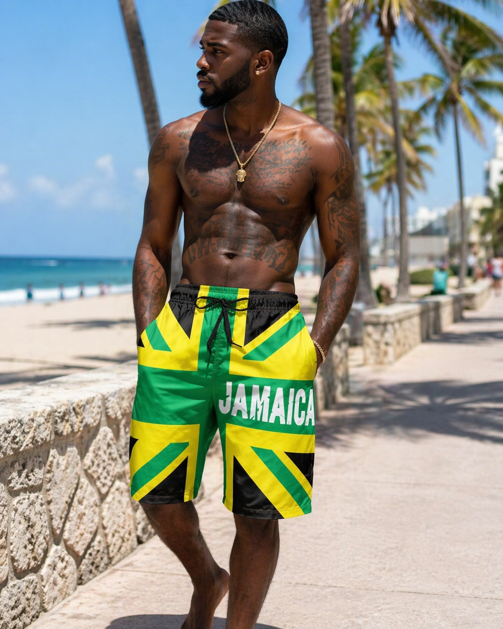 Man wearing Jamaica-themed swim shorts on a beach. Lakay Remedies 
