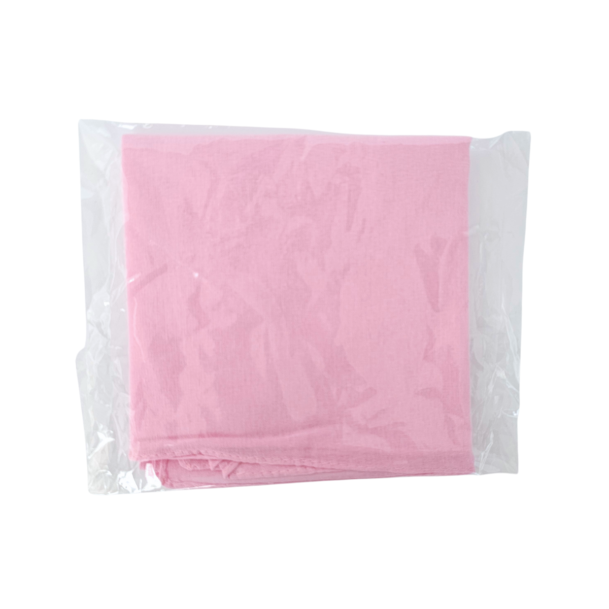 Pink fabric Spiritual Mouchwa in a clear plastic bag on a white background