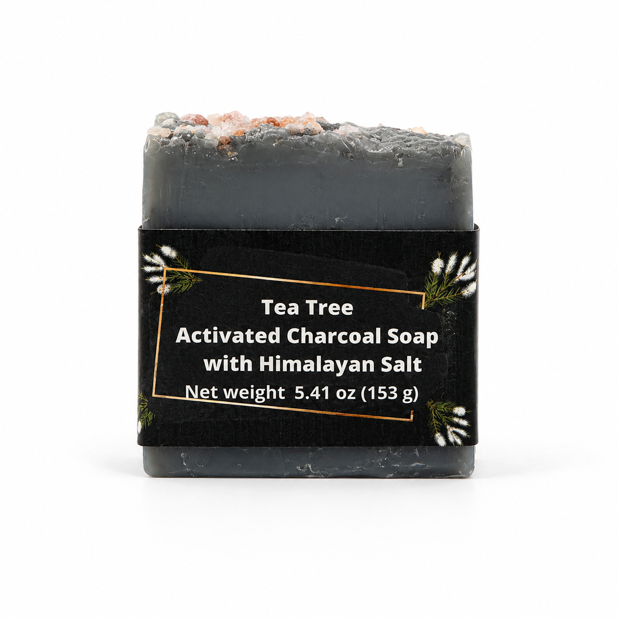 A single bar of soap wrapped in a black paper label. The soap has a dark charcoal gray color with small pink and white mineral flecks on the rough top surface.