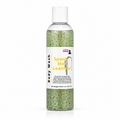 A clear plastic bottle of body wash with a white cap and a white label reading 'Body Wash' and 'Spank Me Leather' in yellow text. The liquid inside is green with black and gold jojoba beads.
