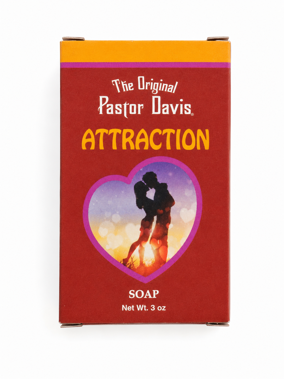 The Original Pastor Davis Attraction soap box, featuring a red front with yellow and purple accents, a heart-shaped graphic of a kissing couple, and white text.