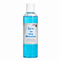 A clear plastic bottle of body wash filled with bright blue liquid, featuring a white cap and a white label with blue text that reads 'Sex in the Shower' and 'Body Wash.'.