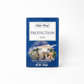 A rectangular blue box of Ohli-Way Protection Soap, featuring a white label at the top and an illustration of a house with a golden dollar sign on the front, set against a plain white background.