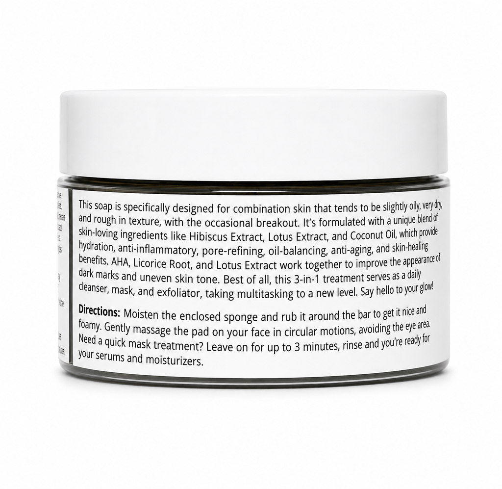 A white cylindrical jar of facial cleanser with a black label, photographed on a clean white background. The label contains detailed product information, including scent notes of hibiscus, lotus, and coconut oil, and usage directions.