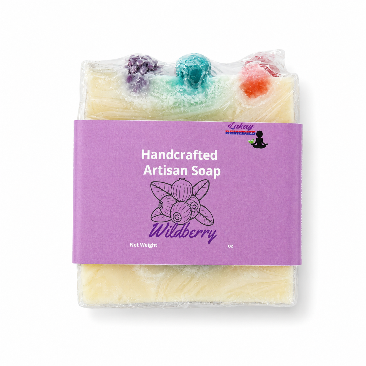 A packaged handmade artisan soap bar labeled 'Wildberry' by Lakay Remedies, wrapped in clear plastic with a purple paper label and colorful berry-like inclusions visible at the top.