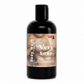 A black plastic bottle of body wash with a black cap, featuring a label that reads 'Body Wash Very Sexy' with a warm-toned graphic of a person's torso on the front.