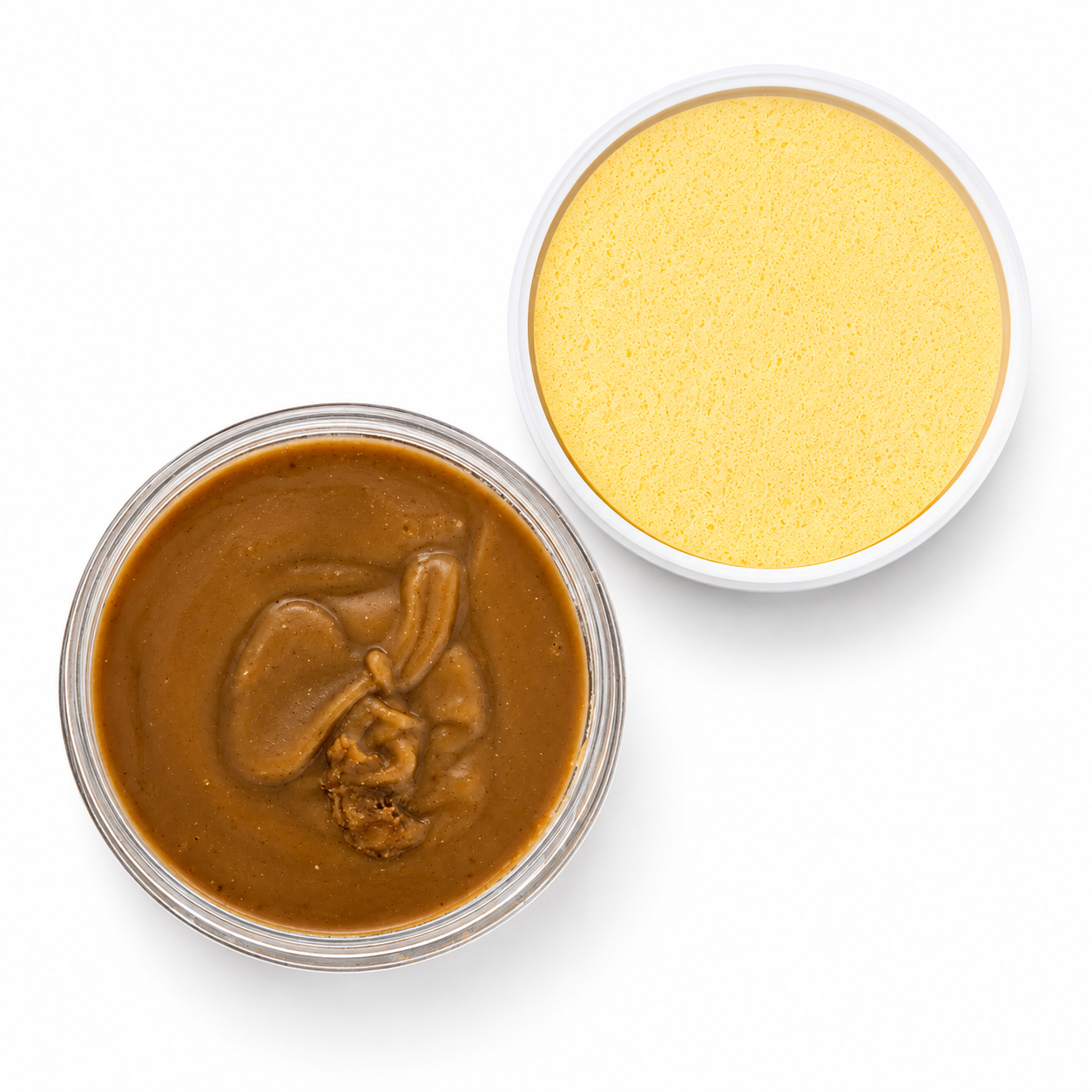 Two round cosmetic pots on a white background: one open jar showing a soap, and one closed pot showing a yellow sponge.