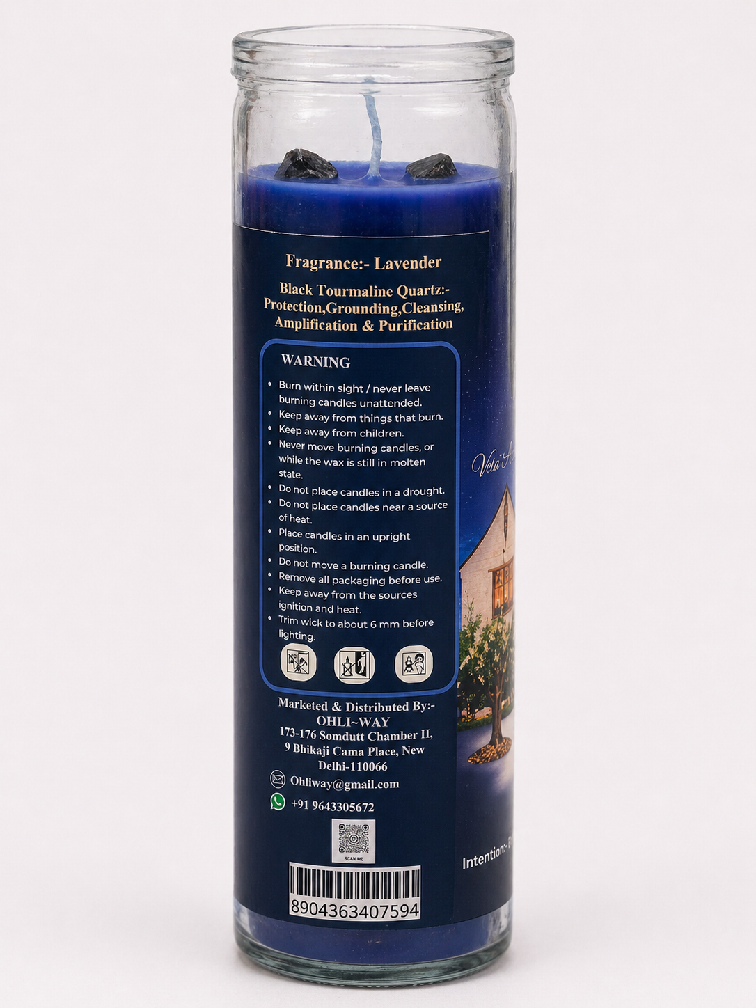 Blue candle with label on a white background
