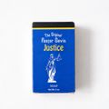A 3 oz box of Justice Soap by The Original Pastor Davis, featuring a vibrant blue front with a white statue of Justice and yellow lettering, set against a plain white background.