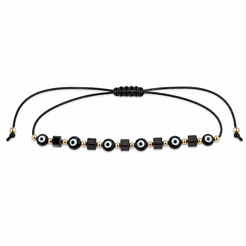 Black and gold beaded bracelet on a white background