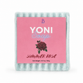 A packaged bar of Yoni Soap in the Summer Rose scent, featuring a light blue-green textured soap bar wrapped in clear plastic with a pink paper label.
