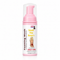 A bottle of Lakay Remedies 'Smell The Rose's' pH balanced daily care foaming wash. The product features a pink pump dispenser and a white label with pink and yellow text, set against a plain white background.