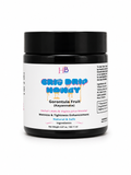 A black glass jar of Her Beauty Factory Grip Drip Honey with a white label, set against a plain white background.