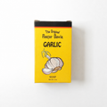 A 3 oz box of The Original Pastor Davis Garlic Soap, featuring a bright yellow label with a black top border, black text, and an illustration of a garlic bulb on a white background.