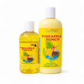 Two bottles of 'Her Beauty Factory' Pineapple Punch Aloe Shea Butter on a white background, one in a clear bottle showing yellow gel and one in a pale yellow bottle.