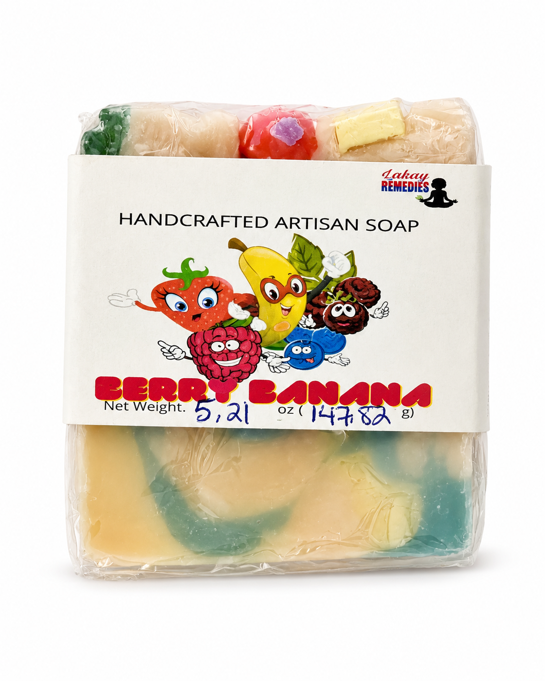 A packaged handmade artisan soap bar labeled 'Berry Banana' by Lucky Remedies, wrapped in clear plastic with a white paper label featuring colorful cartoon fruit characters.