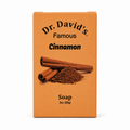 A rectangular orange box of Dr. David's Famous Cinnamon Soap, featuring a graphic of cinnamon sticks and ground cinnamon on the front, set against a plain white background.