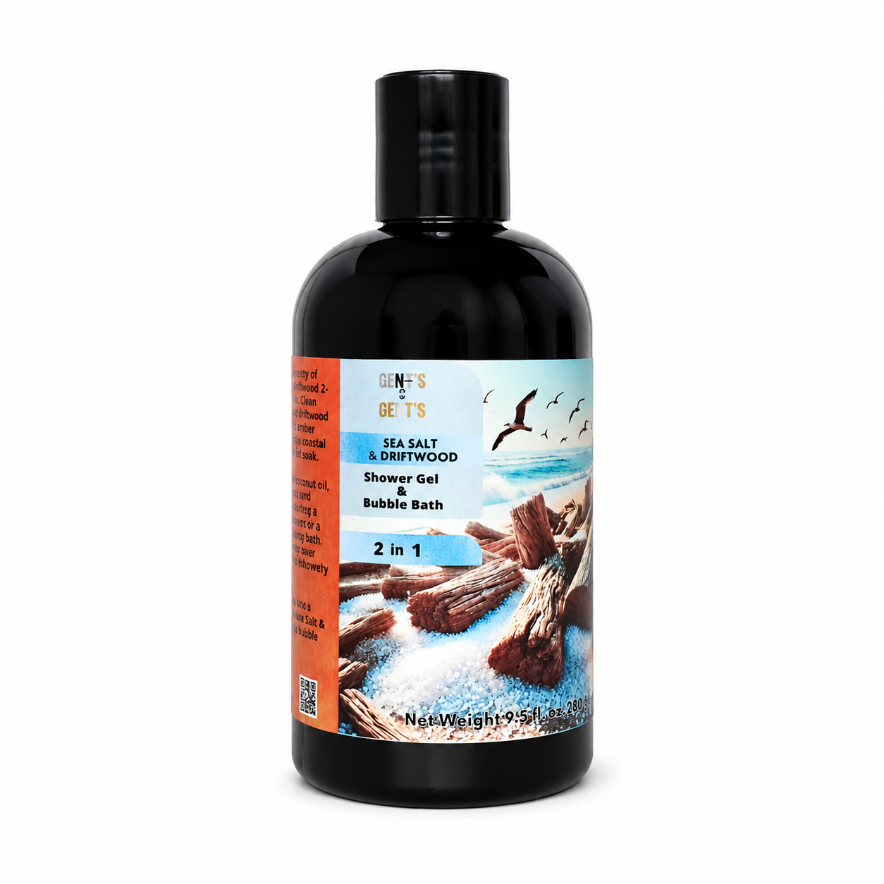 A bottle of Sea Salt & Driftwood  Shower & Bubble Bath, 2 in 1, on a solid white background. The bottle is black with a matching black cap, and the label features an orange side panel and a beach graphic with driftwood and seagulls.