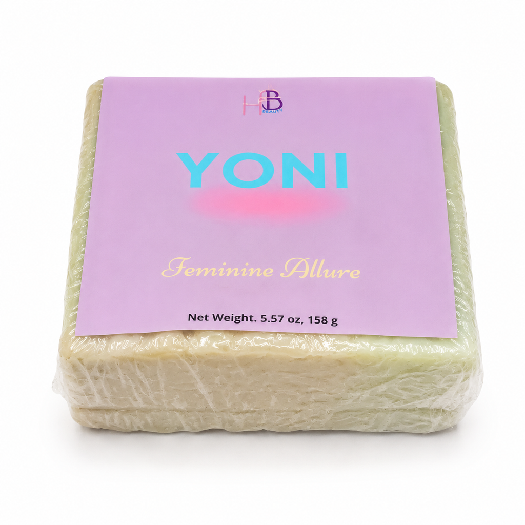 A wrapped bar of soap labeled 'YONI Feminine Allure' by HB Cosmetics, wrapped in clear plastic with a lavender label, on a white background.