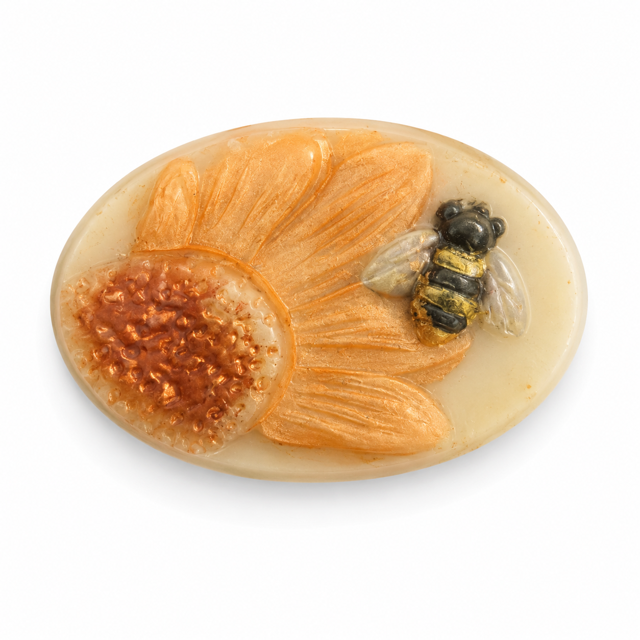 An oval resin brooch featuring a stylized sunflower with orange petals, a textured amber center, and a small detailed bee on the right side, set against a plain white background.