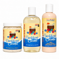 Three coconut-themed body care products from Lakay Remedies on a white background: a jar of Caribbean Coconut sugar scrub, a bottle of Caribbean Coconut body wash, and a bottle of Her Beauty Factory Caribbean Coconut silk amino acid lotion.