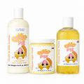 Three cosmetic products from Her Beauty Factory against a white background: a large bottle of Shea Butter Silk Amino acids Lotion on the left, a jar of Whipped Sugar Scrub in the center, and a bottle of Creamy Body Wash on the right. All feature a 'Cute Pie' character label.