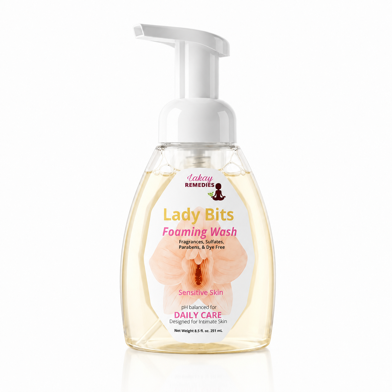 A bottle of Lady Bits Foaming Intimate Wash by Lakay Remedies, featuring a white pump dispenser and a clear bottle showing pale yellow liquid with a peach-colored label, set against a plain white background.