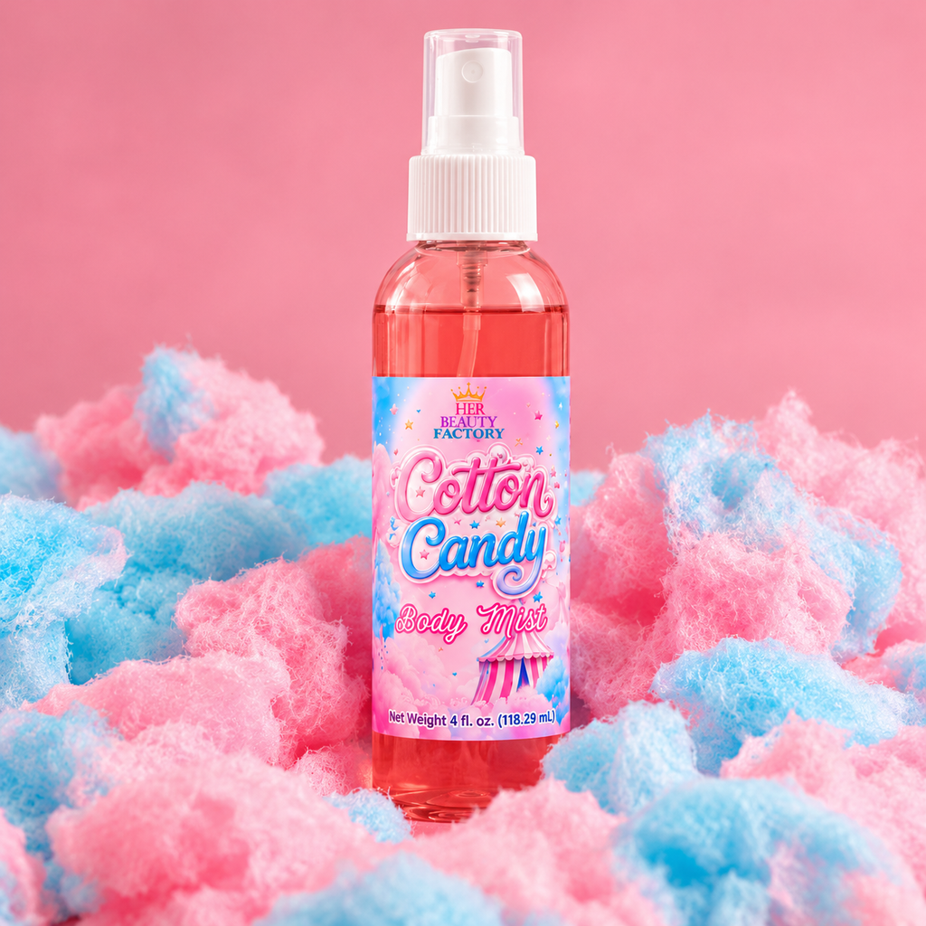 Her Beauty Factory Cotton Candy Body Mist in a pink spray bottle displayed by cotton candy.