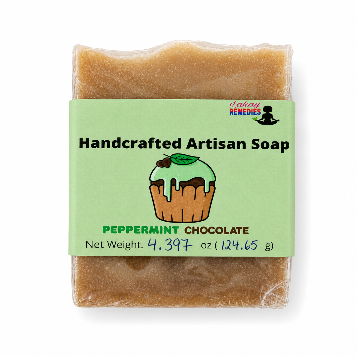 A single bar of handmade soap wrapped in clear plastic with a light green paper label. The label reads 'Handcrafted Artisan Soap' and 'PEPPERMINT CHOCOLATE,' with a cupcake illustration.