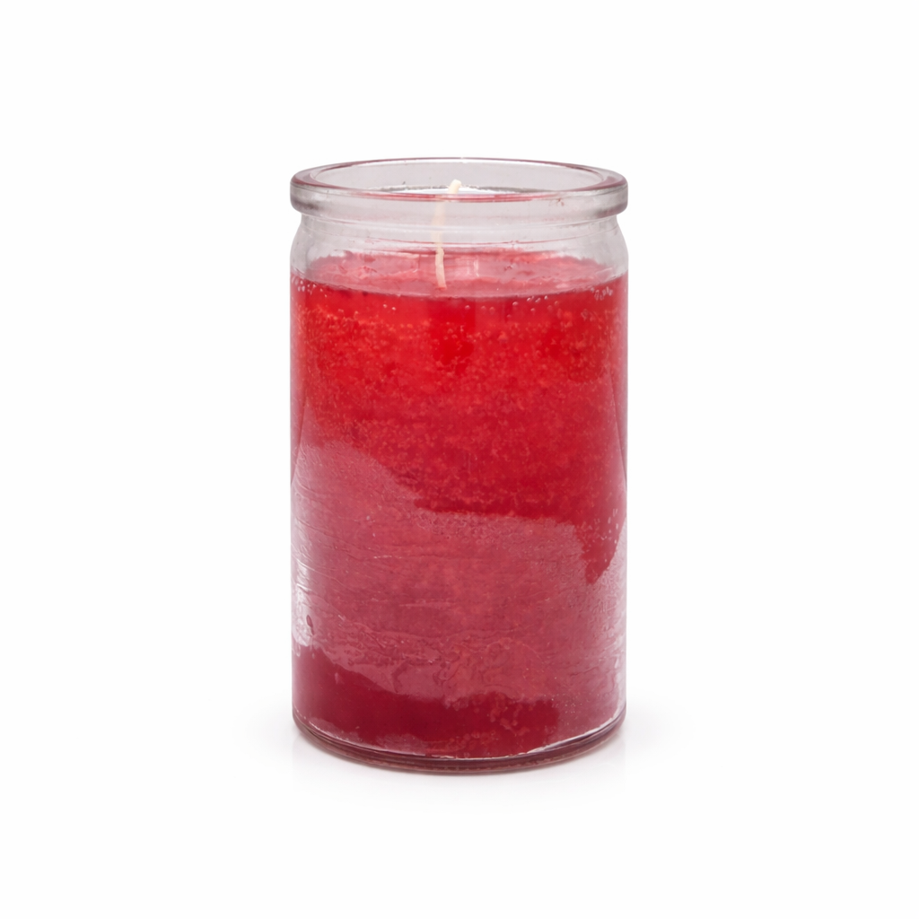 Red candle in a glass jar on a white background