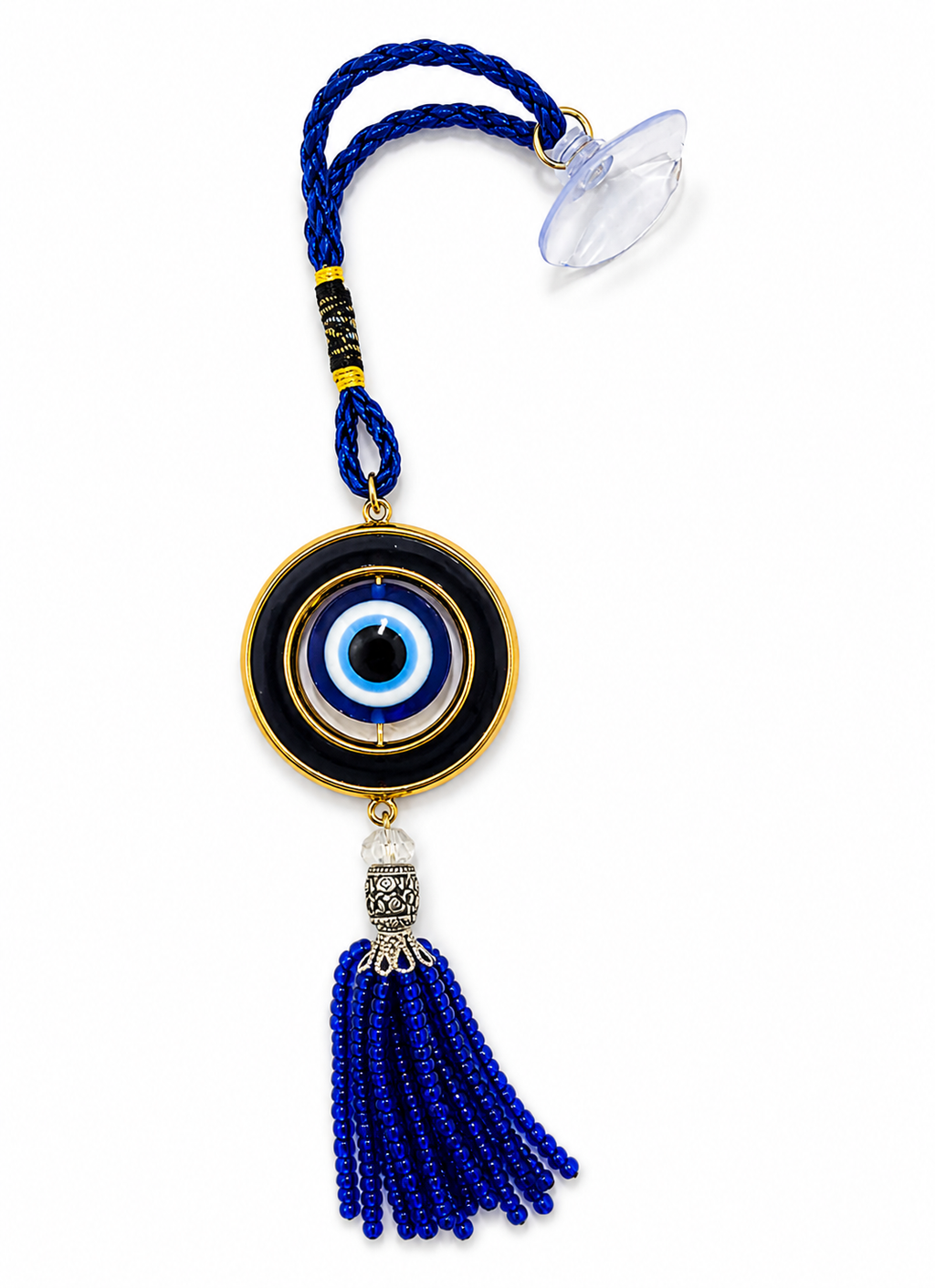 Blue evil eye charm with tassel on a white background